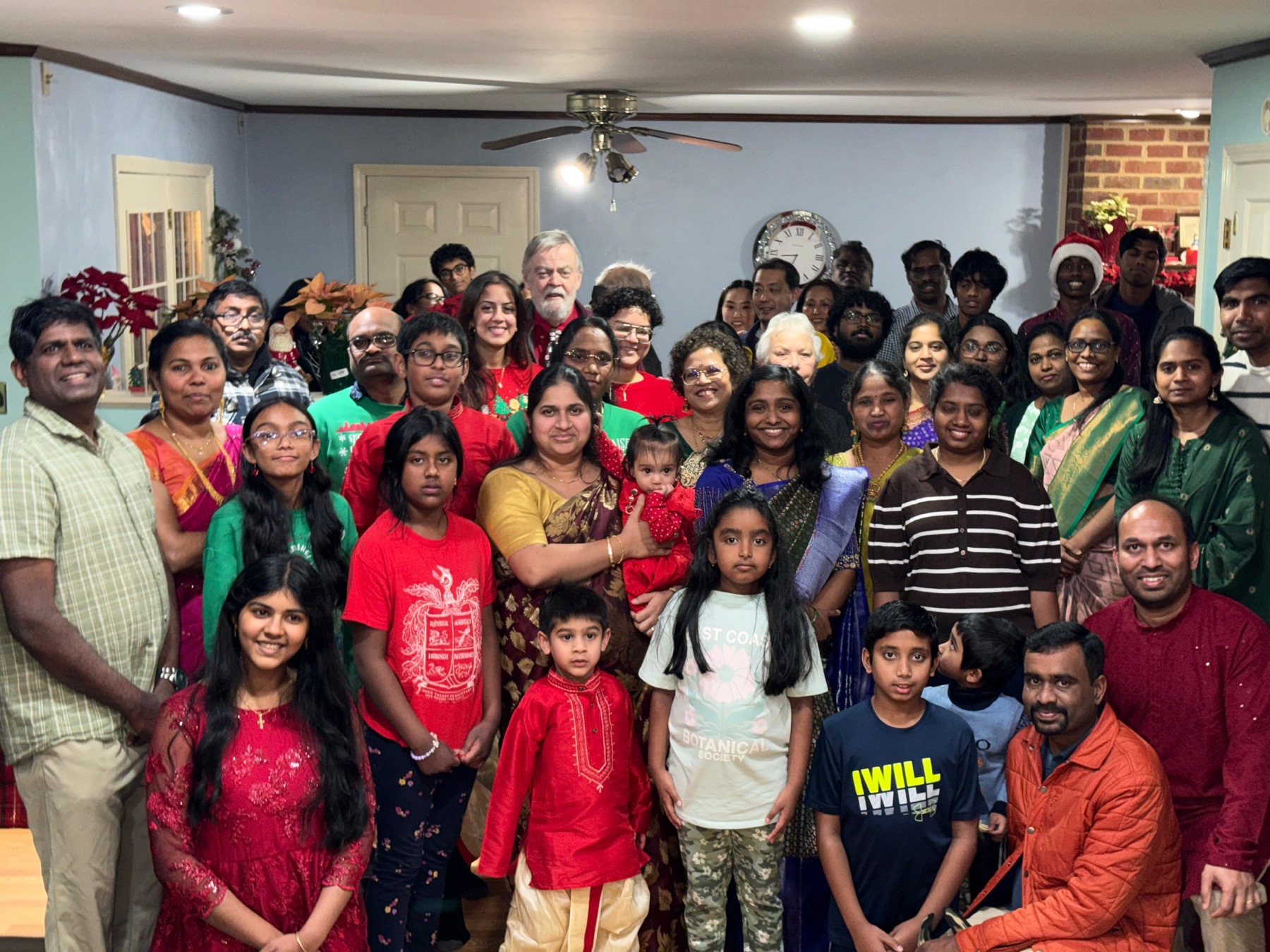 Graceful Gathering fellowship members and guests assembled indoors during a Christmas gathering